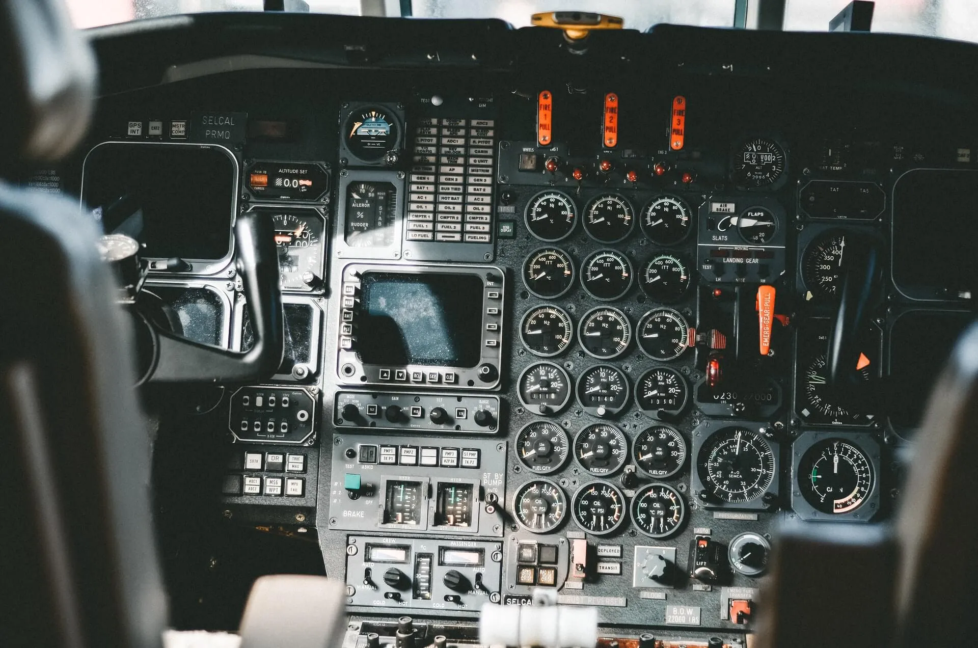 Plane cockpit full of switches